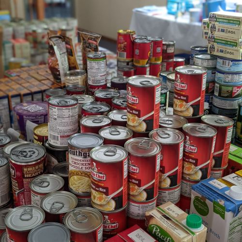 large pile of canned goods