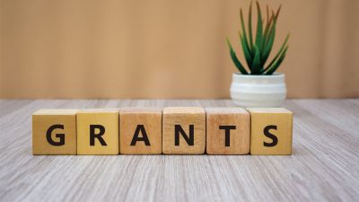 Building blocks spell out the word grants