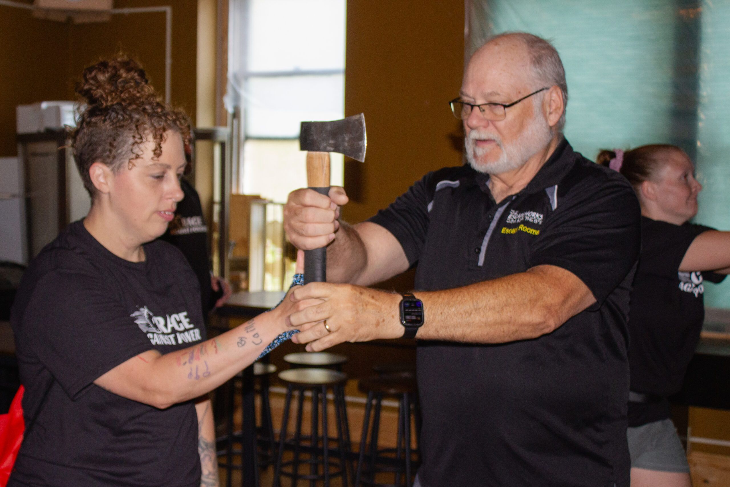 The winners of the 2024 Race Against Poverty smile with their awards
